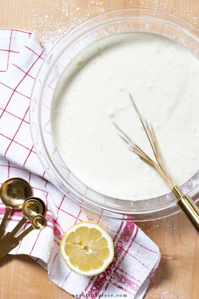 box cake mix tips cake batter in bowl with whisk