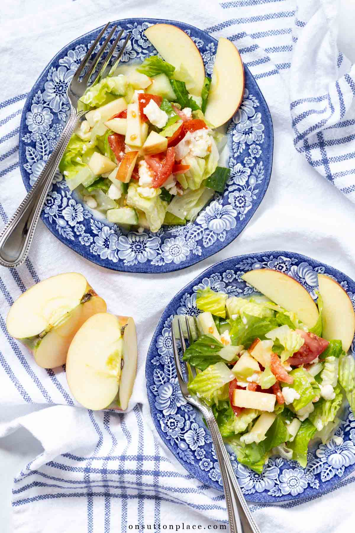 romaine salad recipe with apples and feta on liberty blue plates