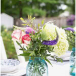 how to arrange garden flowers with herbs pin with text
