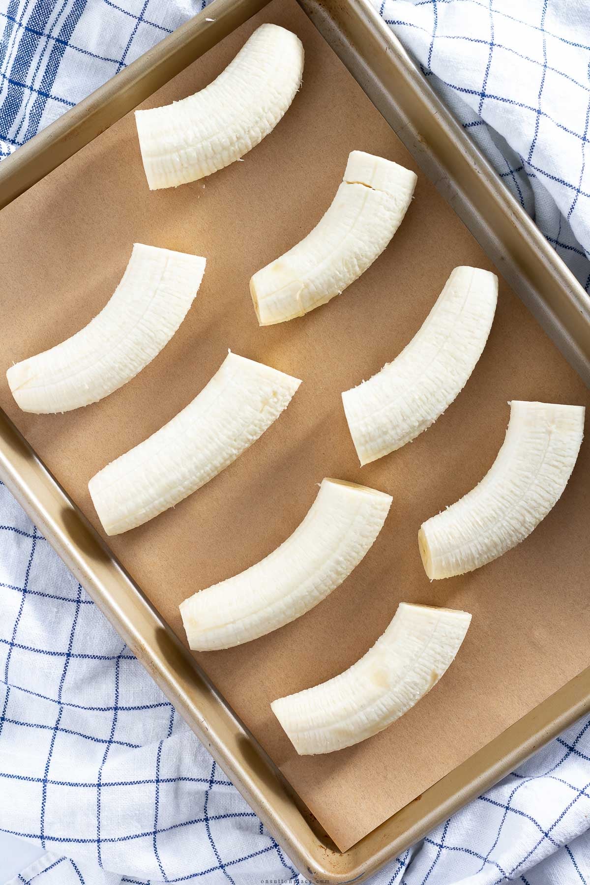 how to freeze bananas halves on baking sheet
