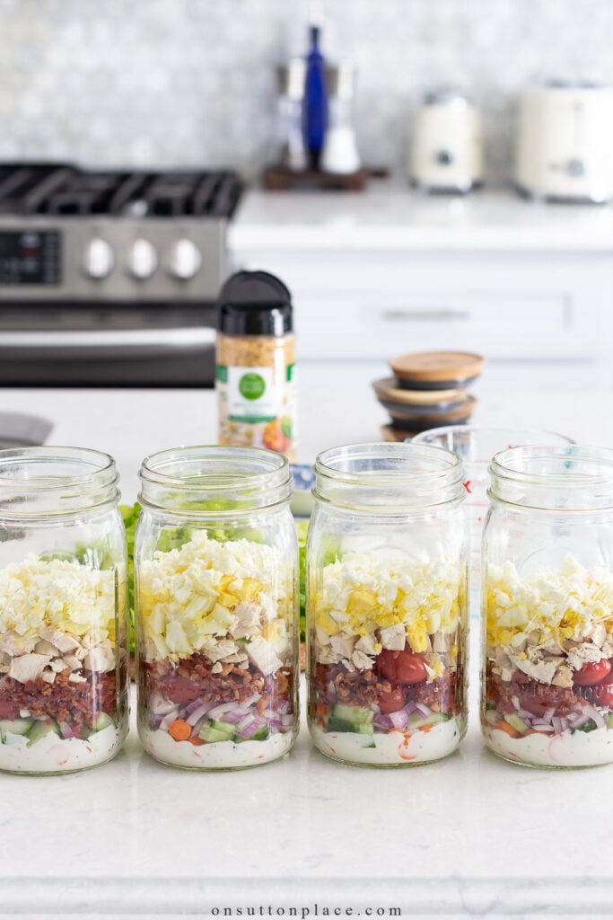 meal prep salads layered in mason jars