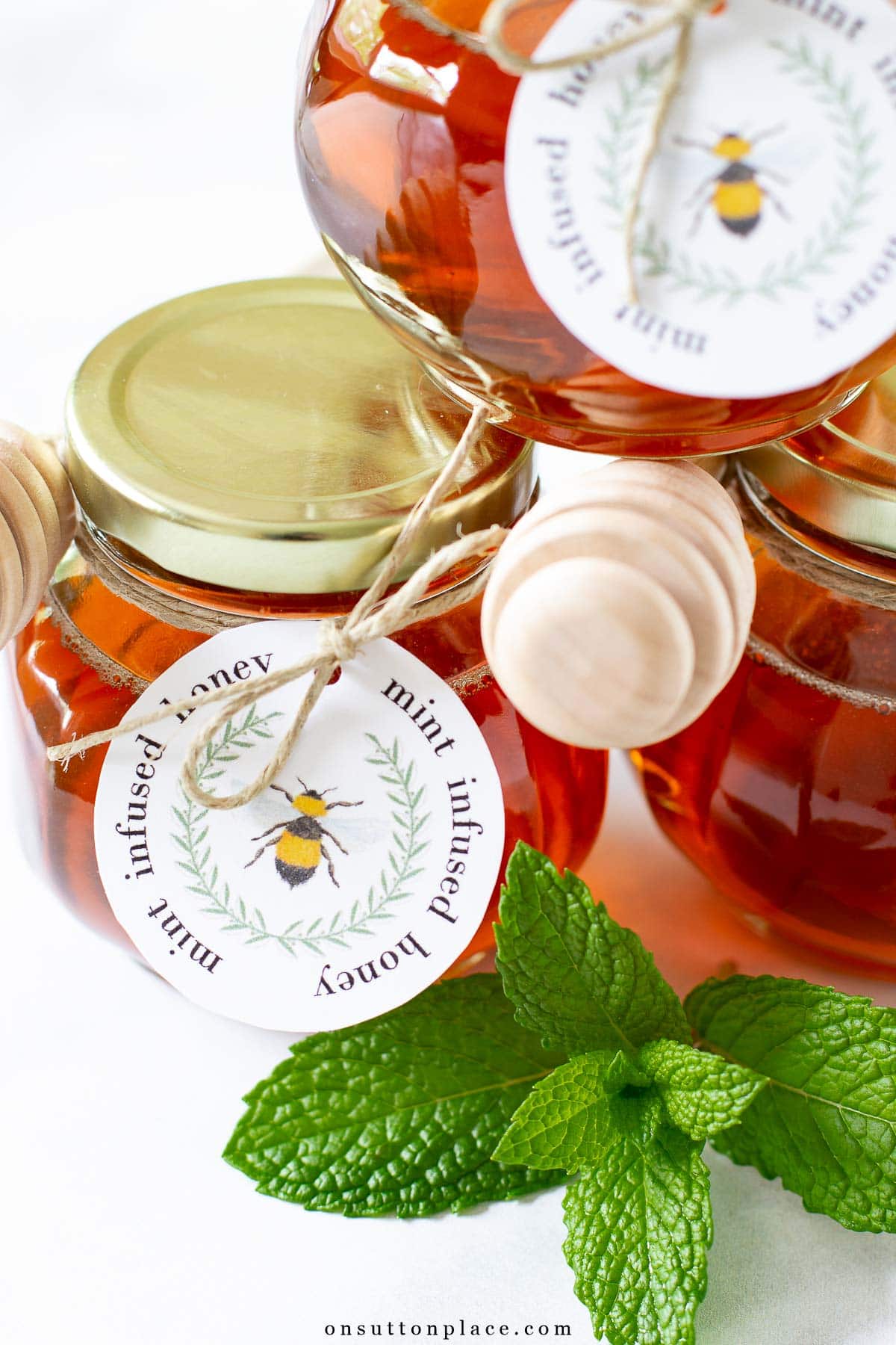 mint infused honey in jars with tag