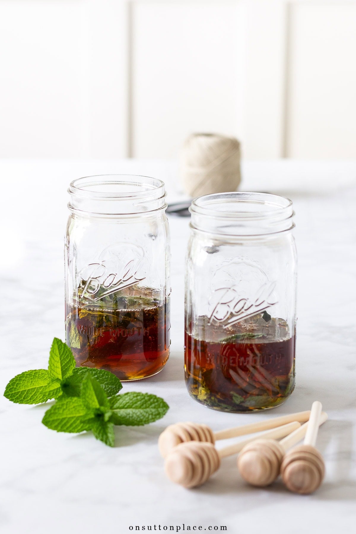 mint infused honey recipe in jars