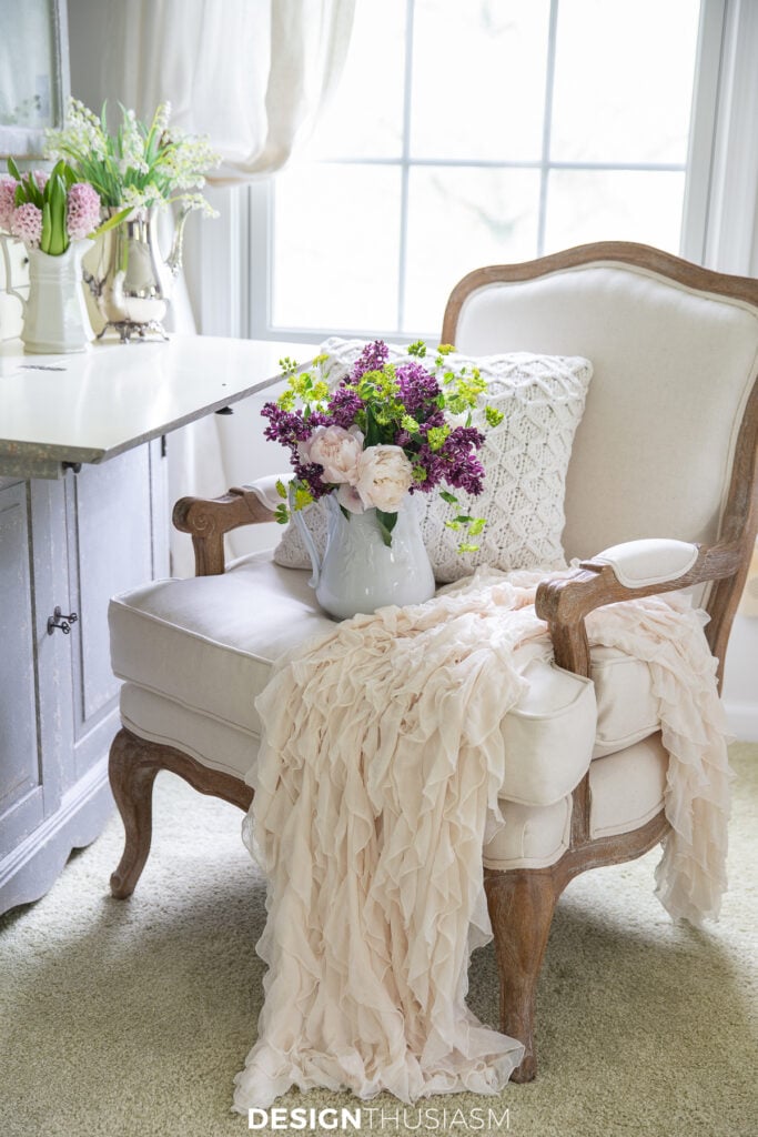 French sitting chair with flowers and throw blanket designthusiasm