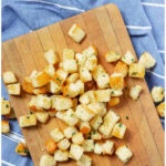 homemade croutons recipe with kings hawaiian rolls pin with text