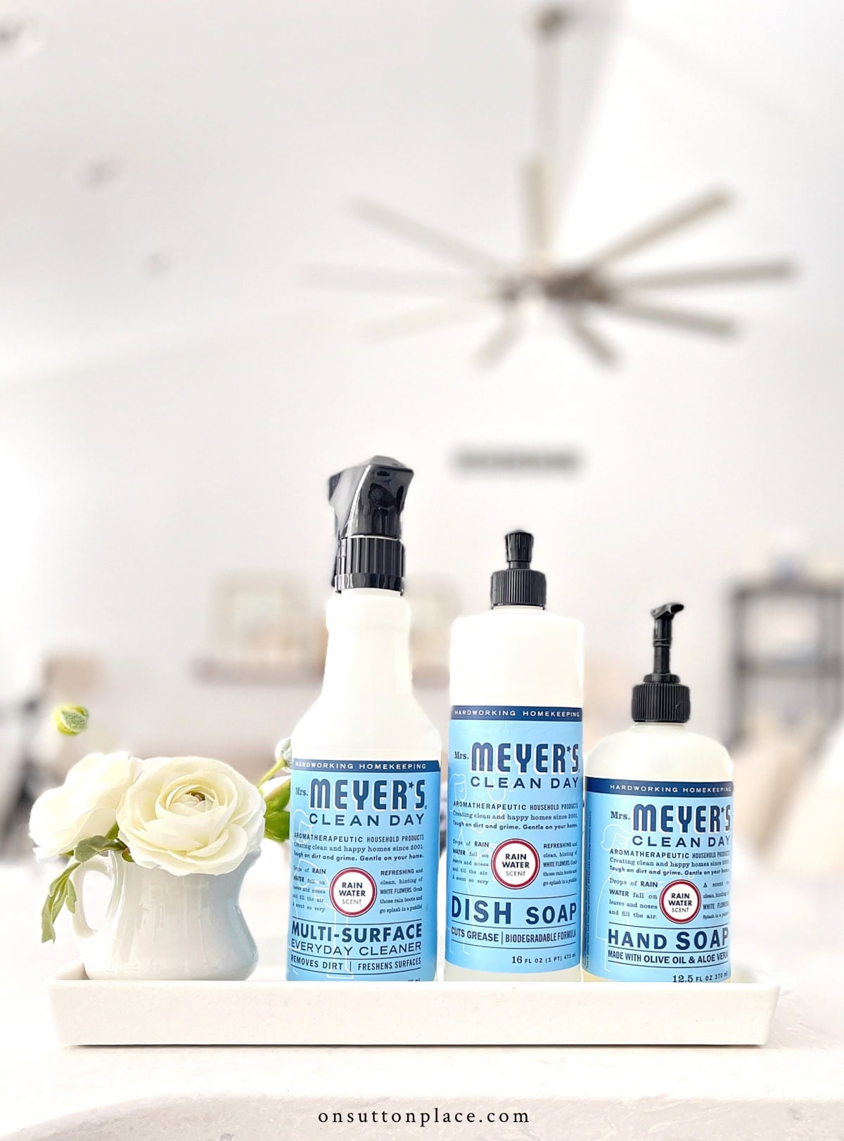 Use these six ideas for a quick and simple kitchen refresh that will bring style to any kitchen. Brighten a tired space by adding items from the grocery, and pretty yet functional accessories. mrs. meyers kitchen set on small tray by kitchen sink