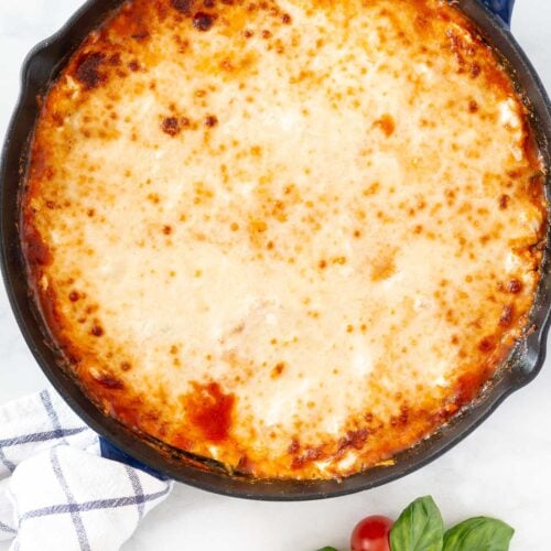zucchini lasagan recipe baked in a cast iron skillet