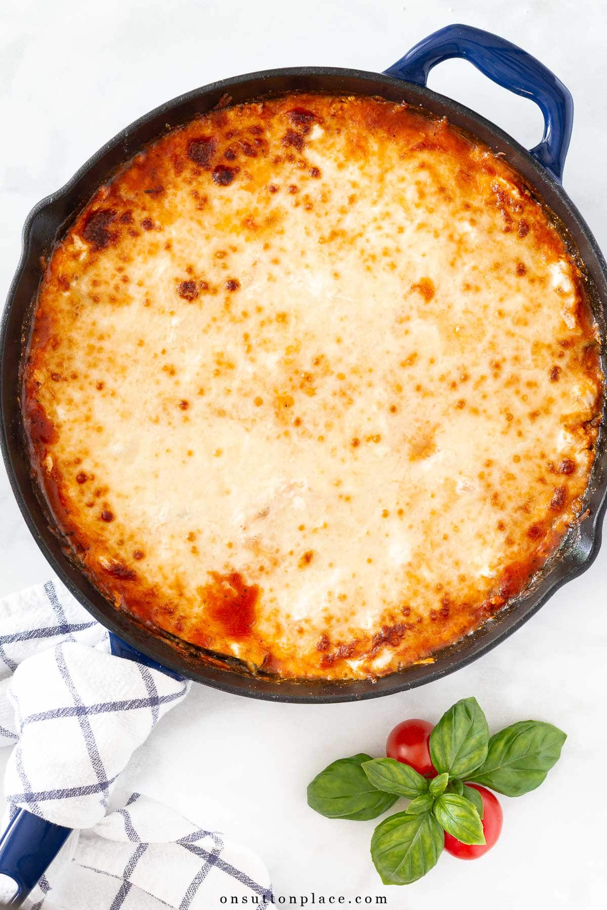 zucchini lasagan recipe baked in a cast iron skillet