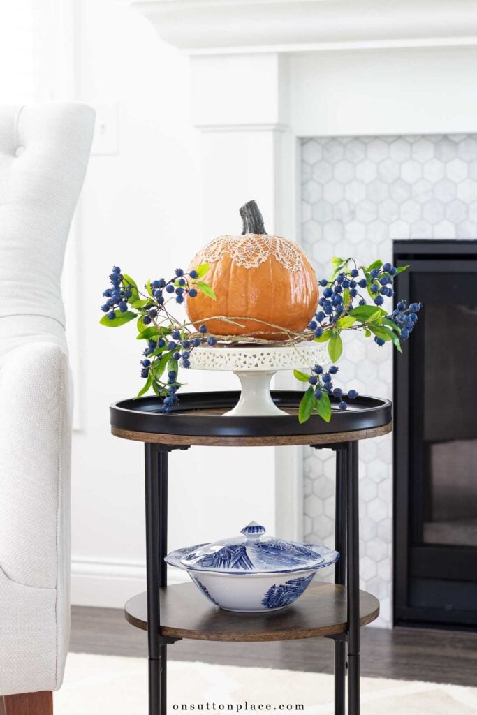 round side table with pumpkin decor