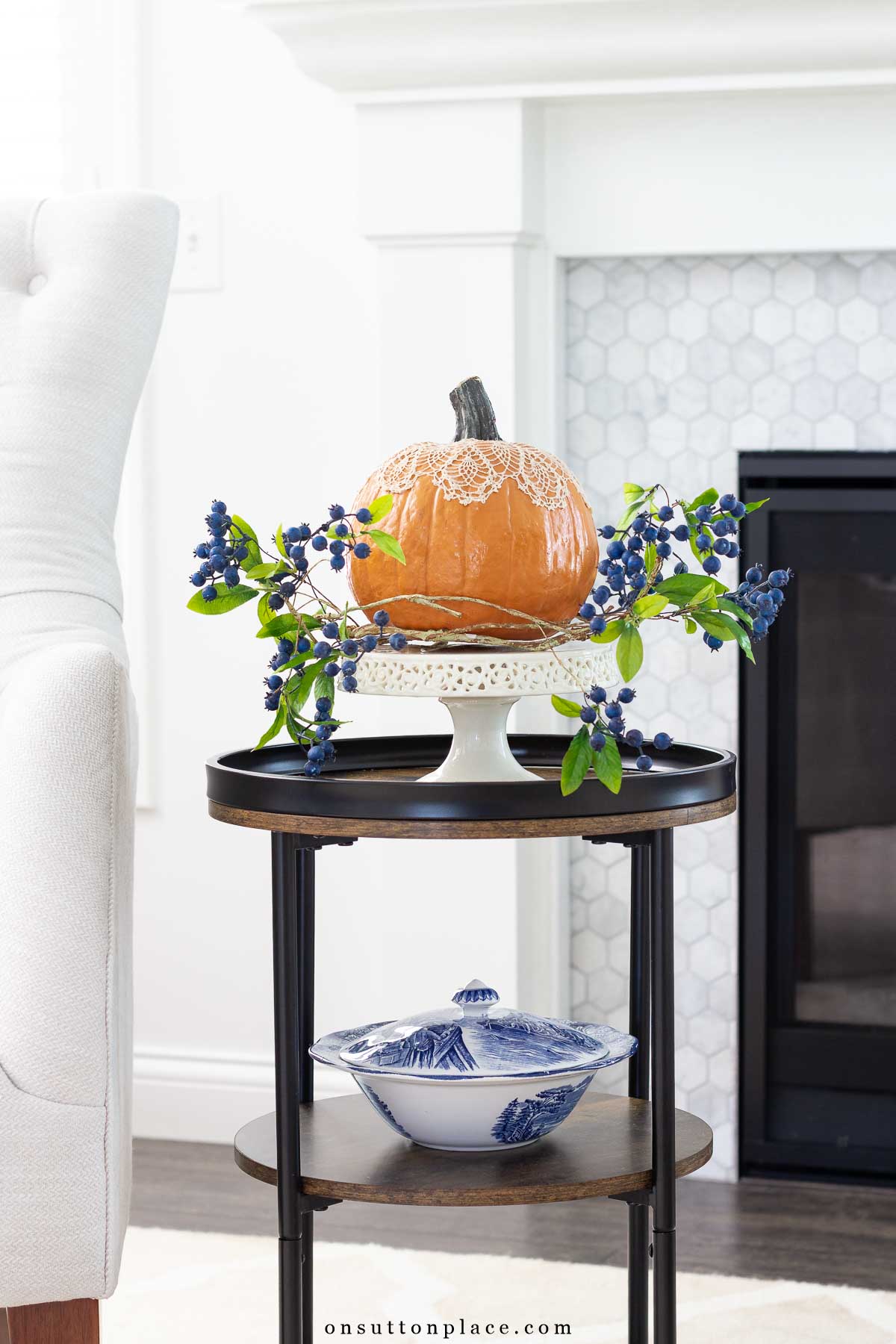 round side table with pumpkin decor