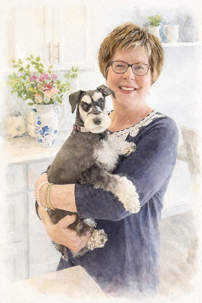 ann holding millie in kitchen sidebar image watercolor 1