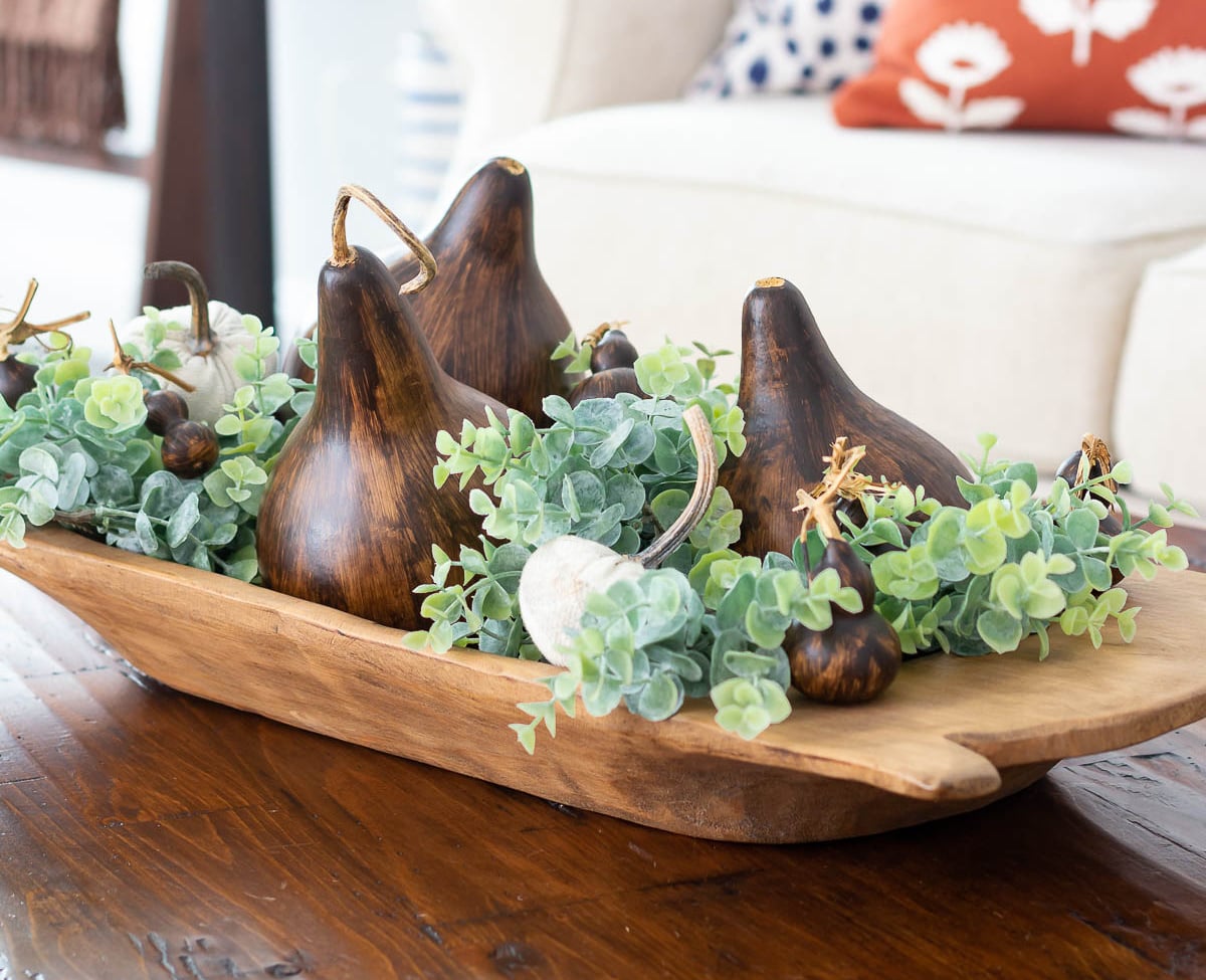 fall dough bowl arrangement with dried gourds cropped
