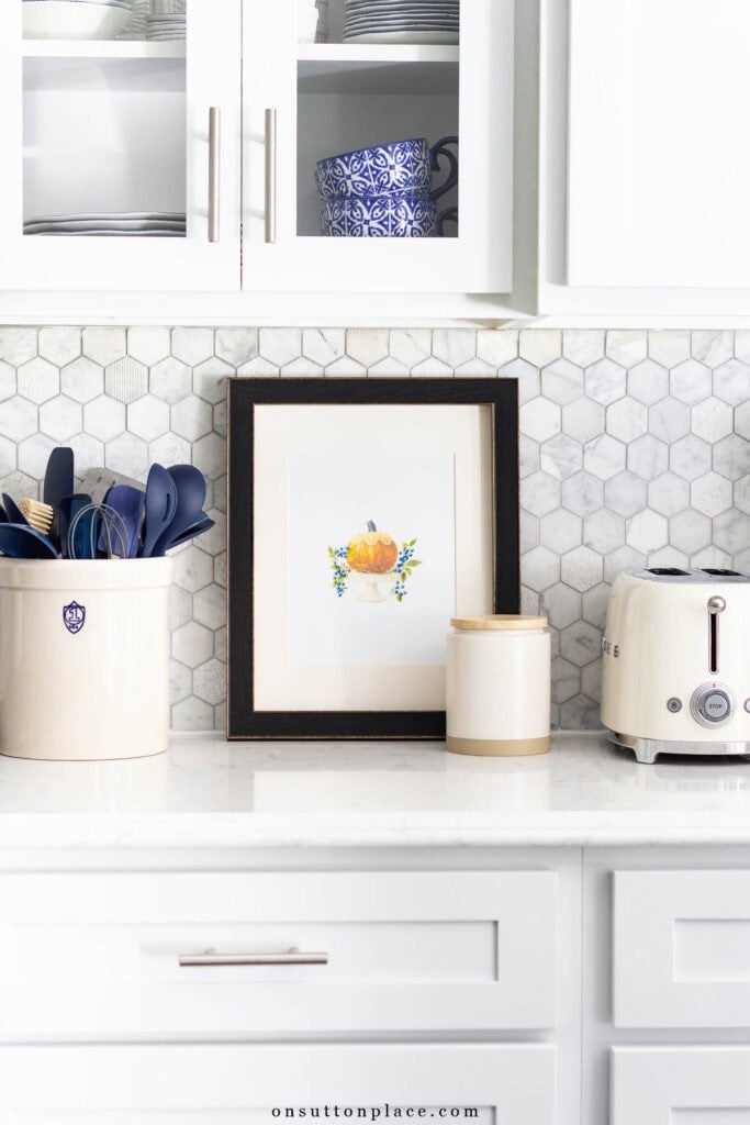 kitchen counter with framed fall printable wall art