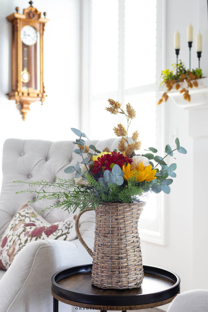 warm inviting decor ideas wicker pitcher with flowers