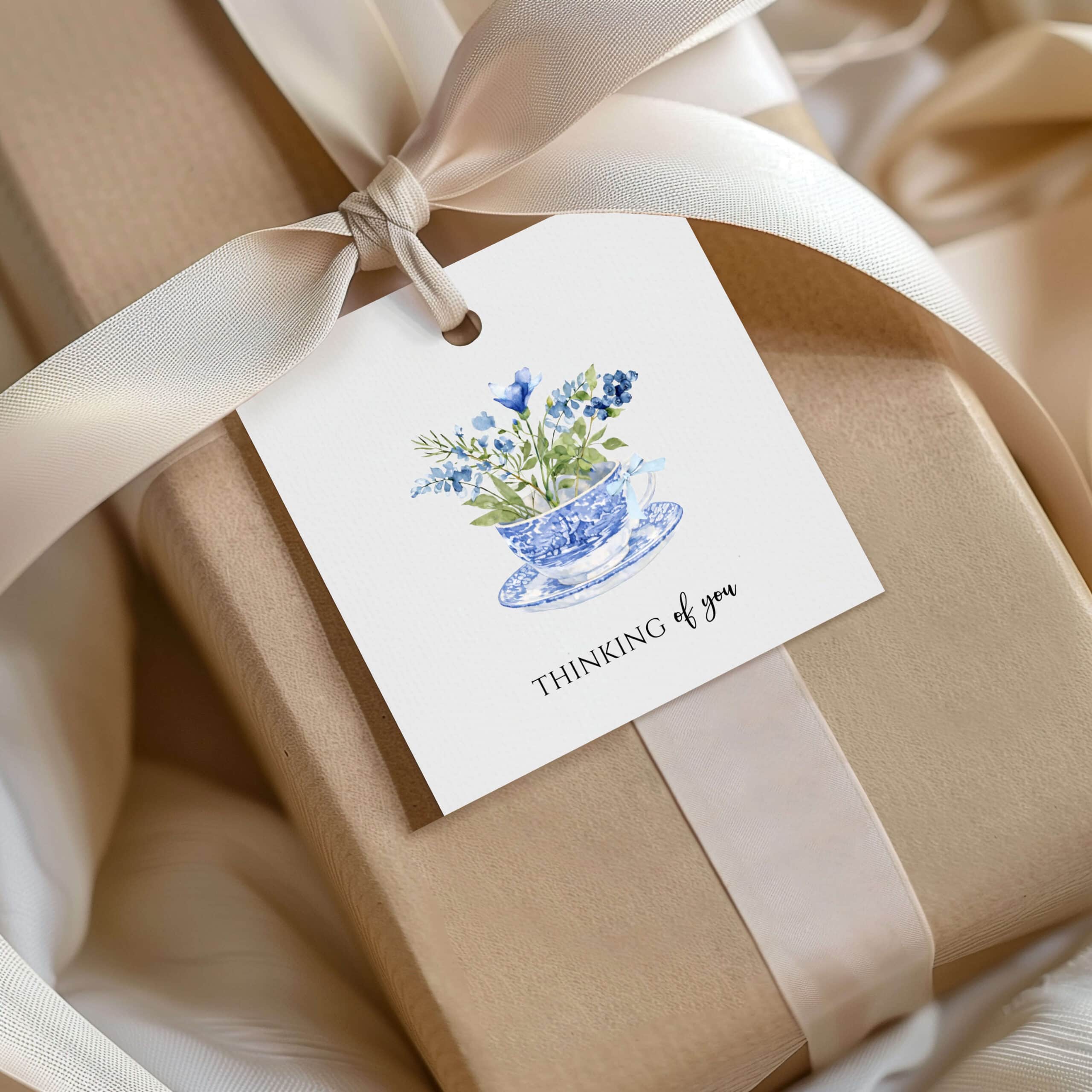 blue teacup with flowers thinking of you gift tag mockup reduced