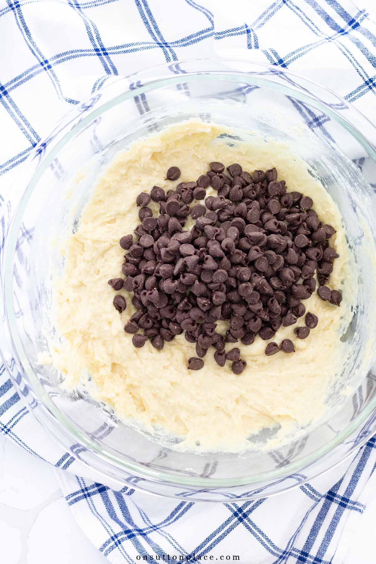 chocolate chip muffins recipe batter in bowl with chips