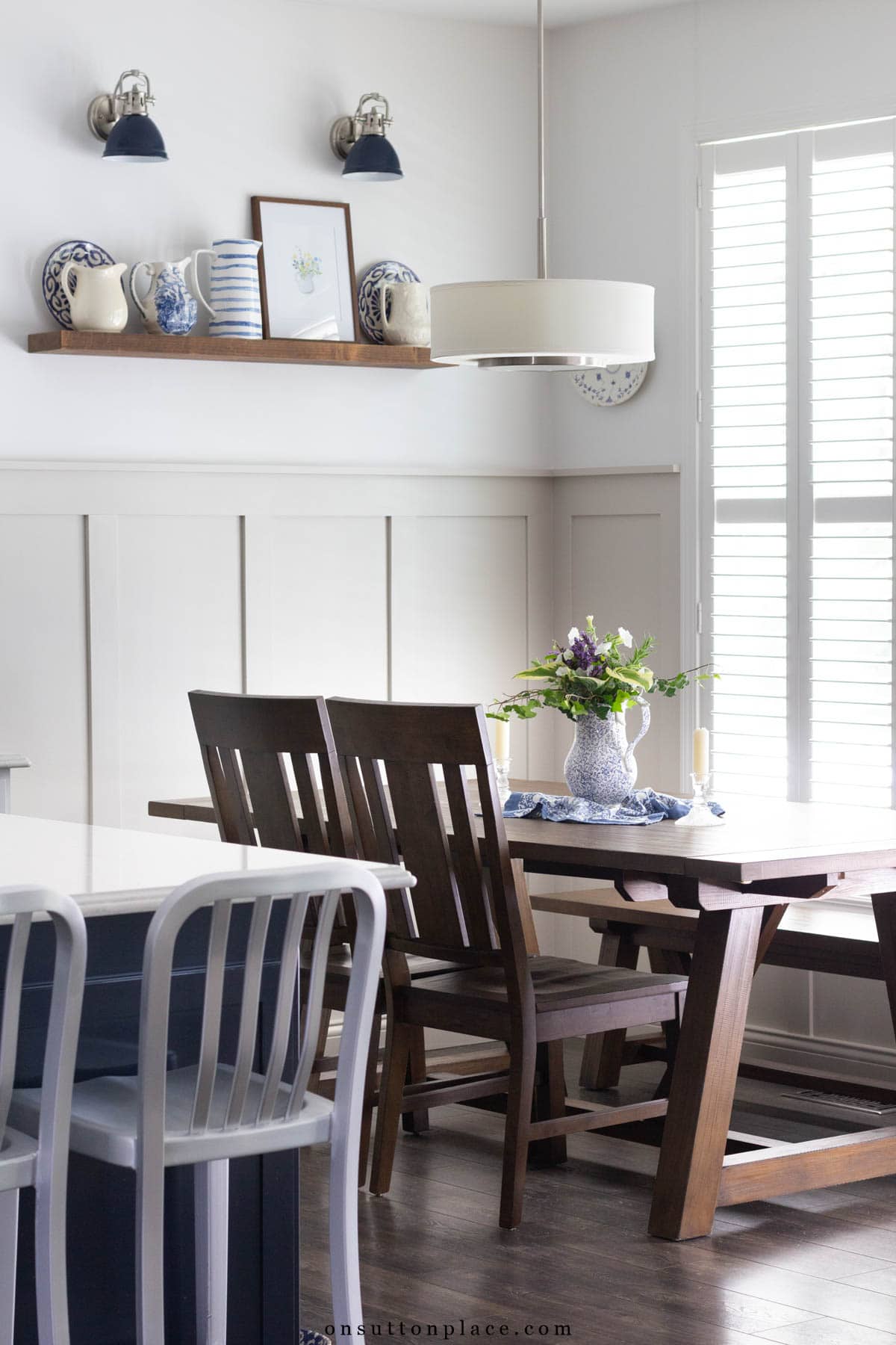board and batten dining nook with floating shelf