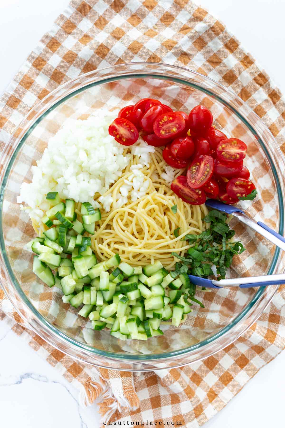 cold spaghetti salad recipe ingredients in pyrex bowl