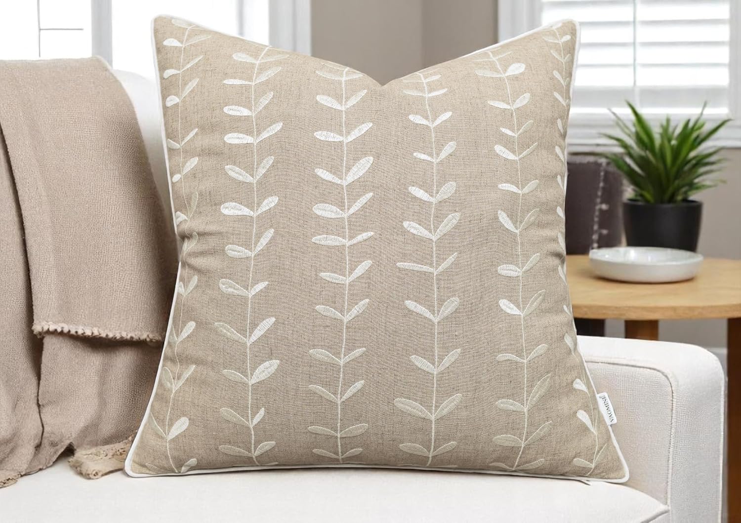 embroidered neutral pillow cover