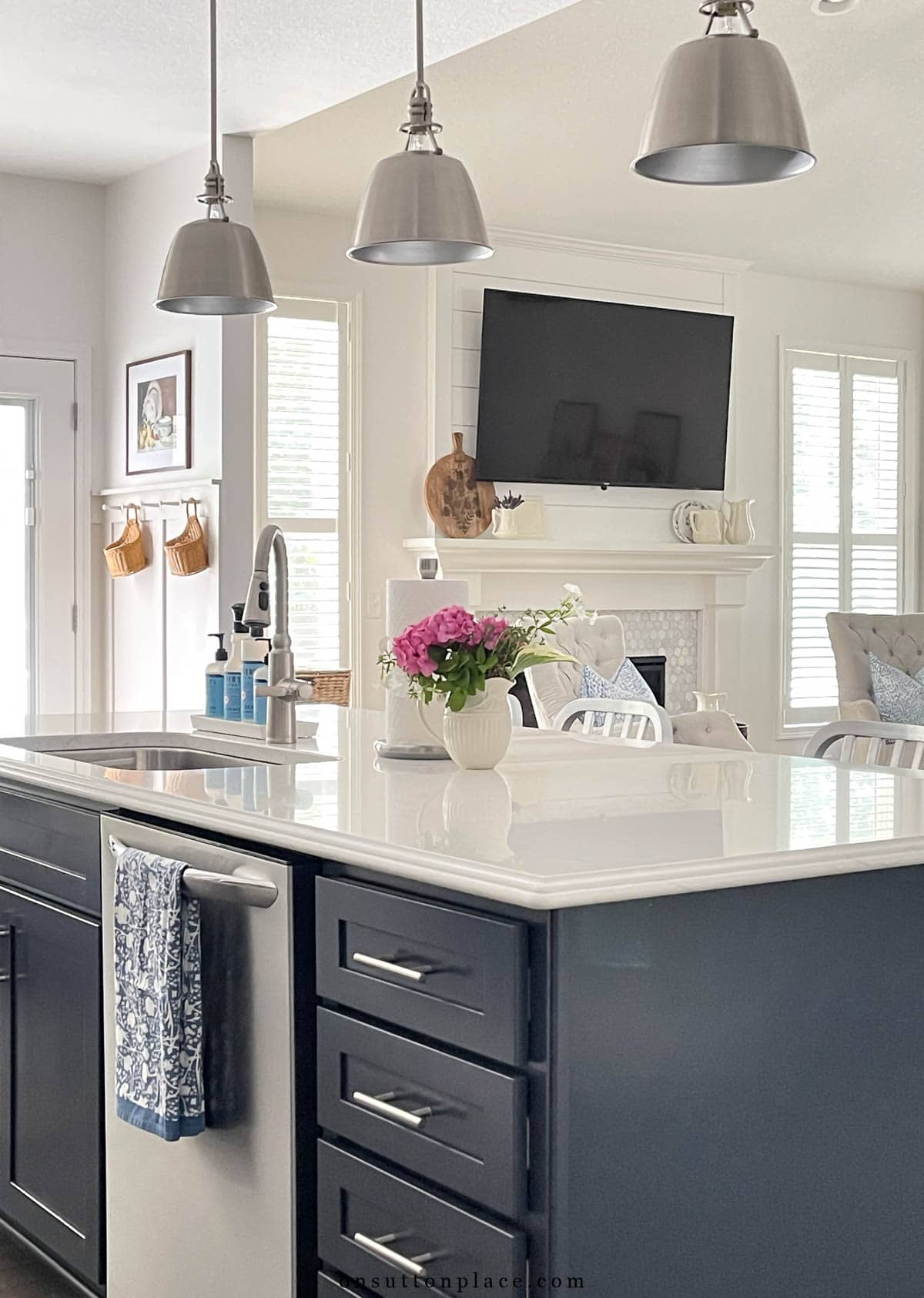 navy blue kitchen island white quartz countertop