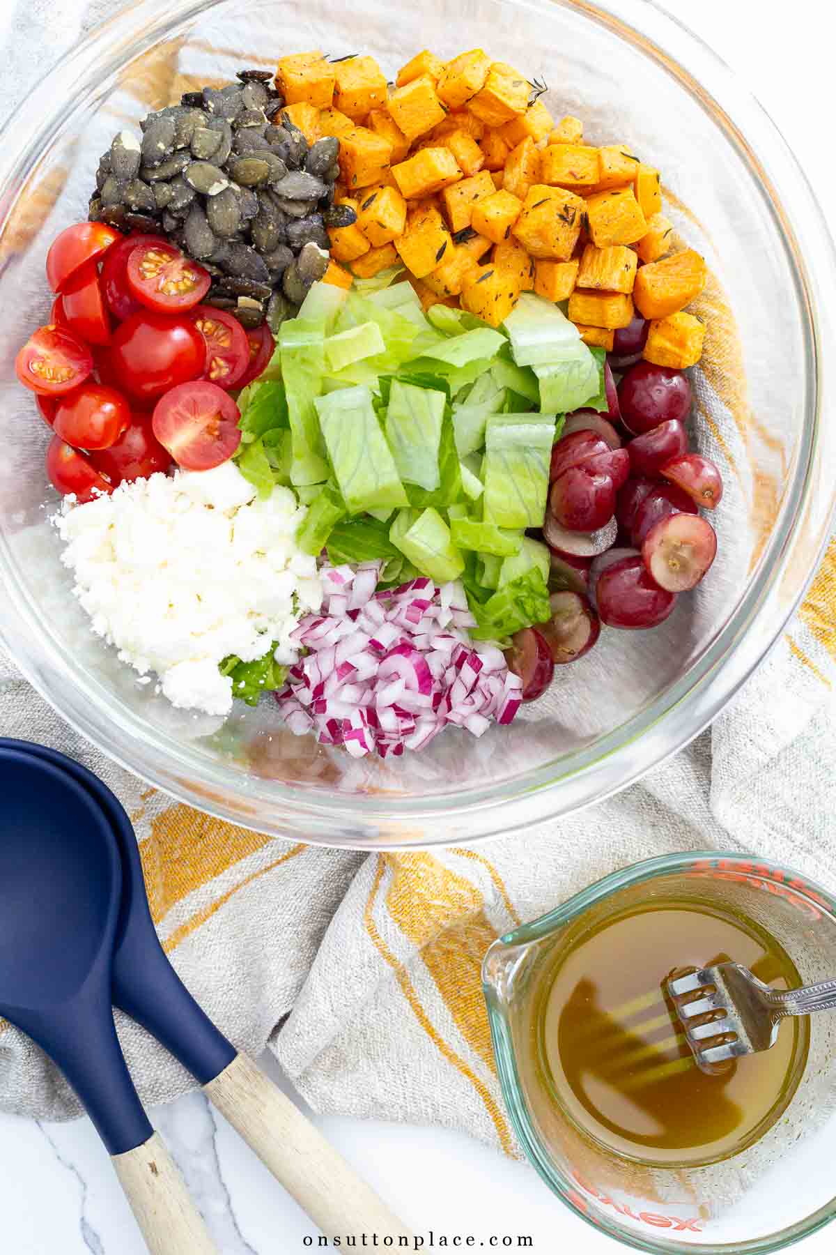 autumn romaine lettuce salad ingredients in pyrex bowl
