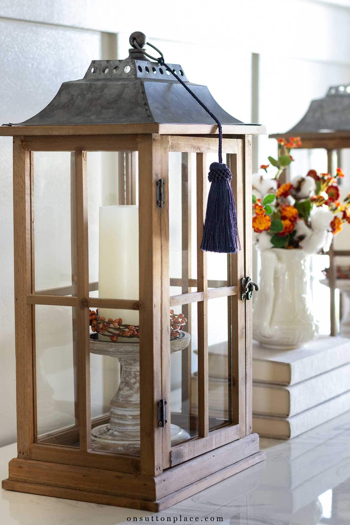 rustic wood lantern with navy tassel