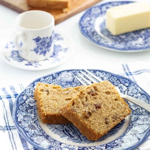 slices of pecan bread on a small blue and white plate