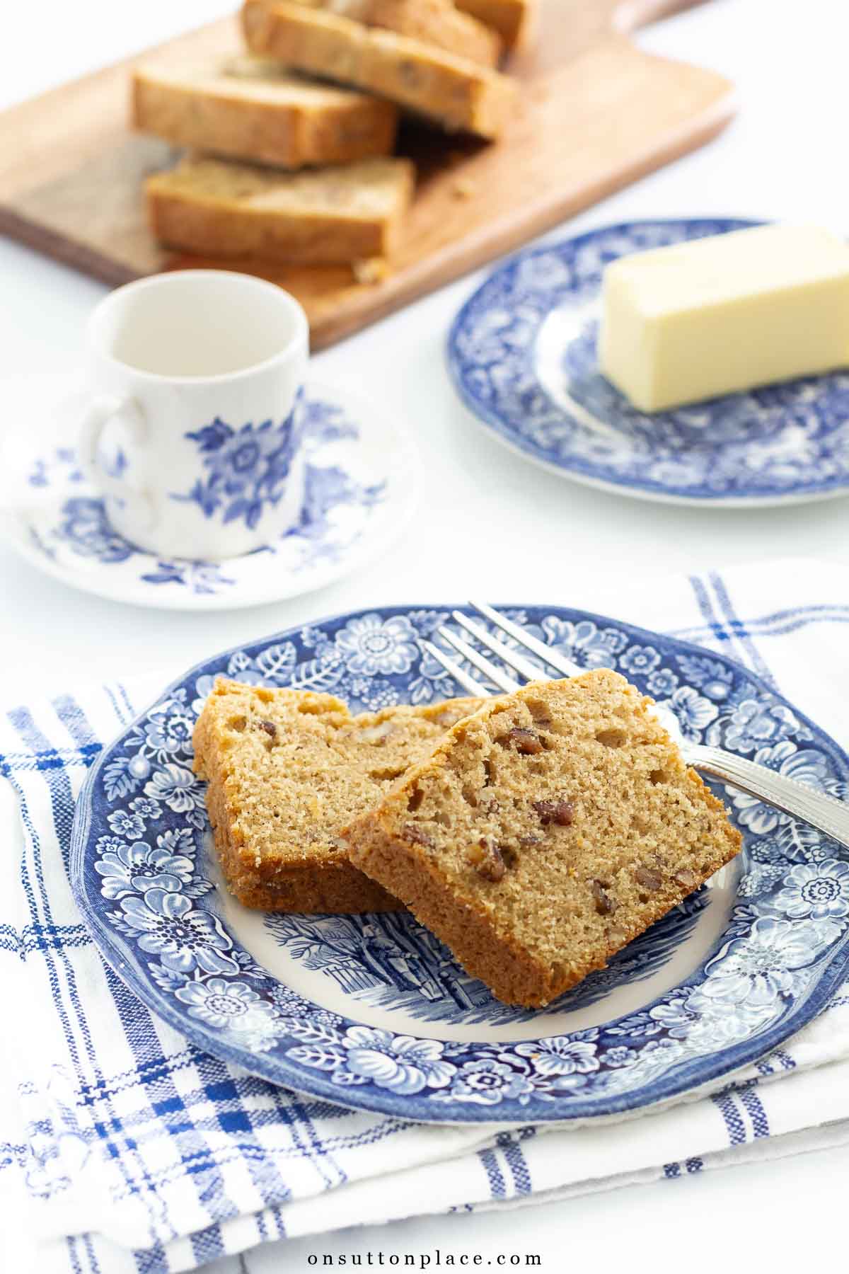 slices of pecan bread on a small blue and white plate