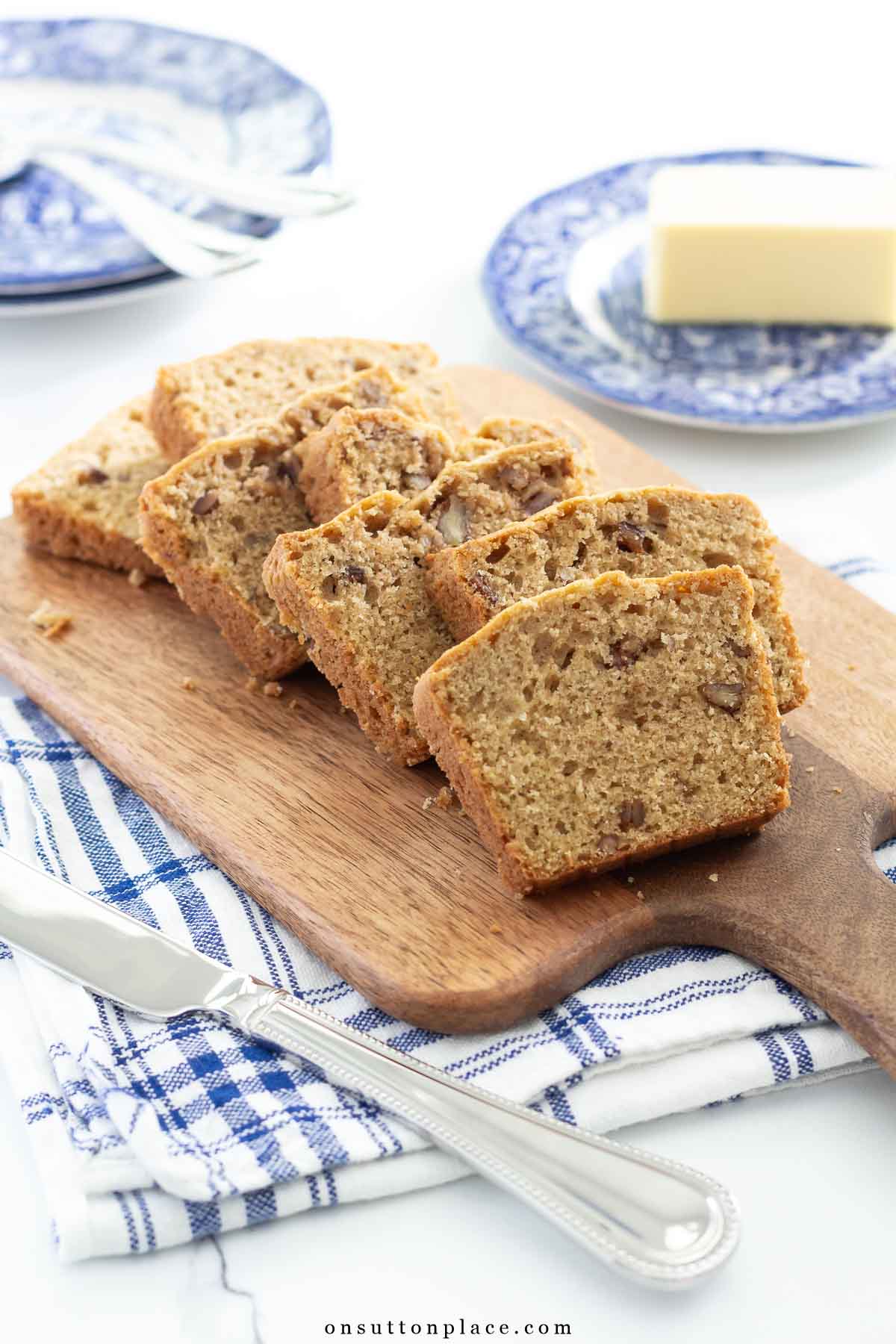 slices of pecan bread on a wood cutting board