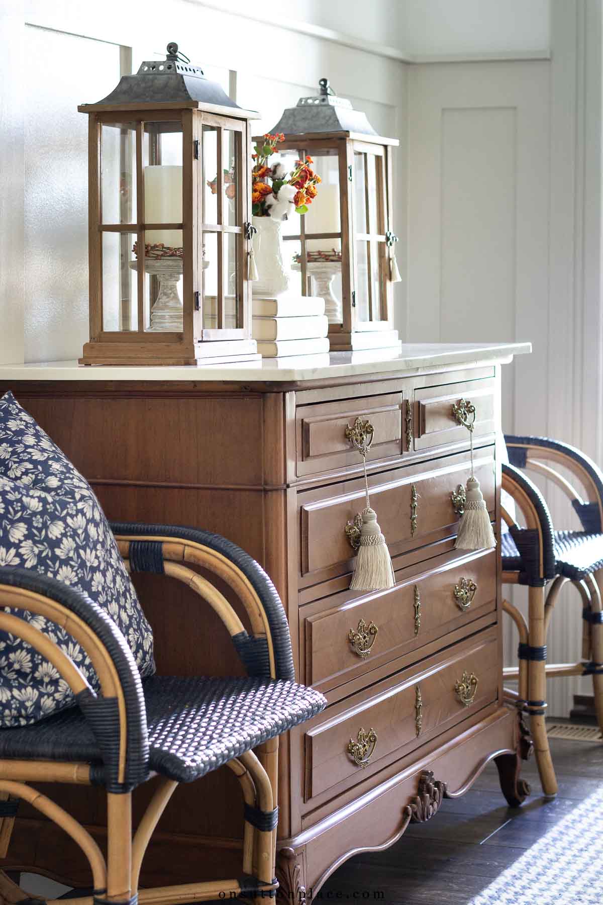 tassels hanging from dresser handles in foyer