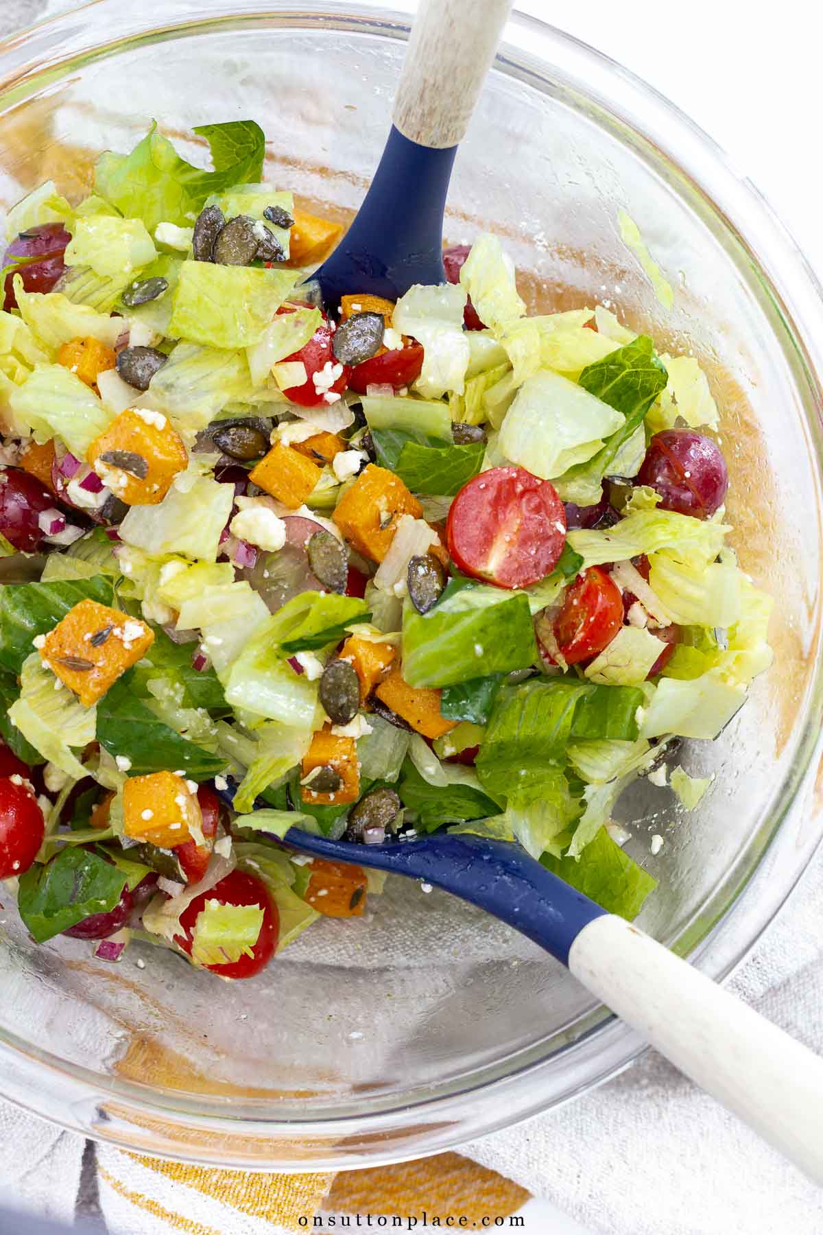tossed autumn romaine lettuce salad recipe in clear bowl