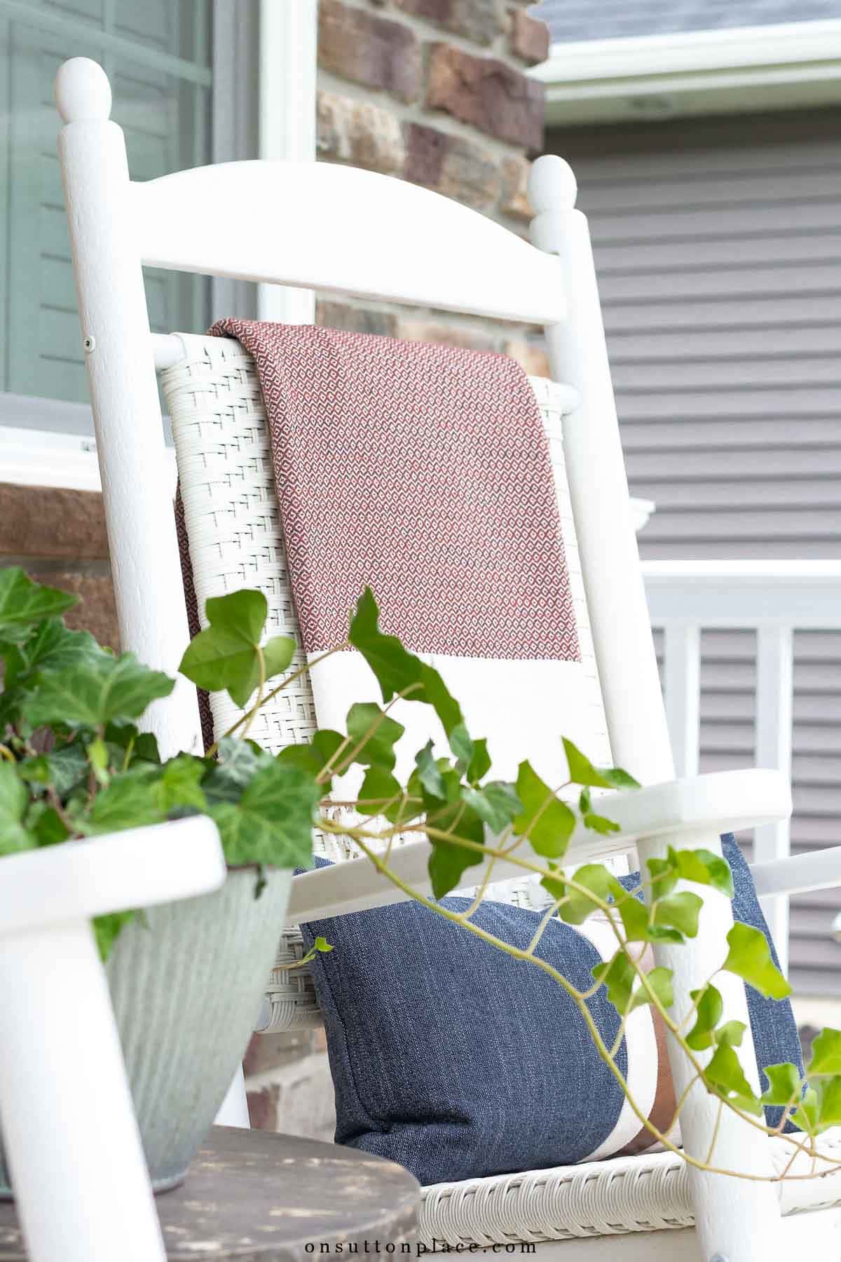 ivy in planter porch rocker with fall throw blanket-9