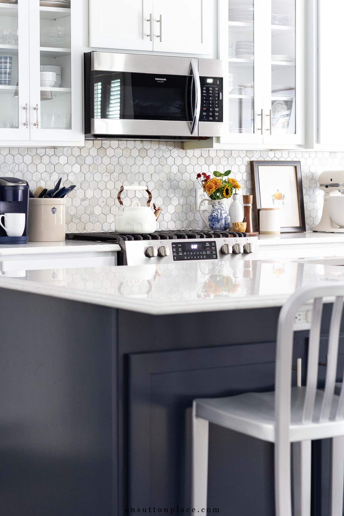 kitchen with fall decor accents and shiny countertops