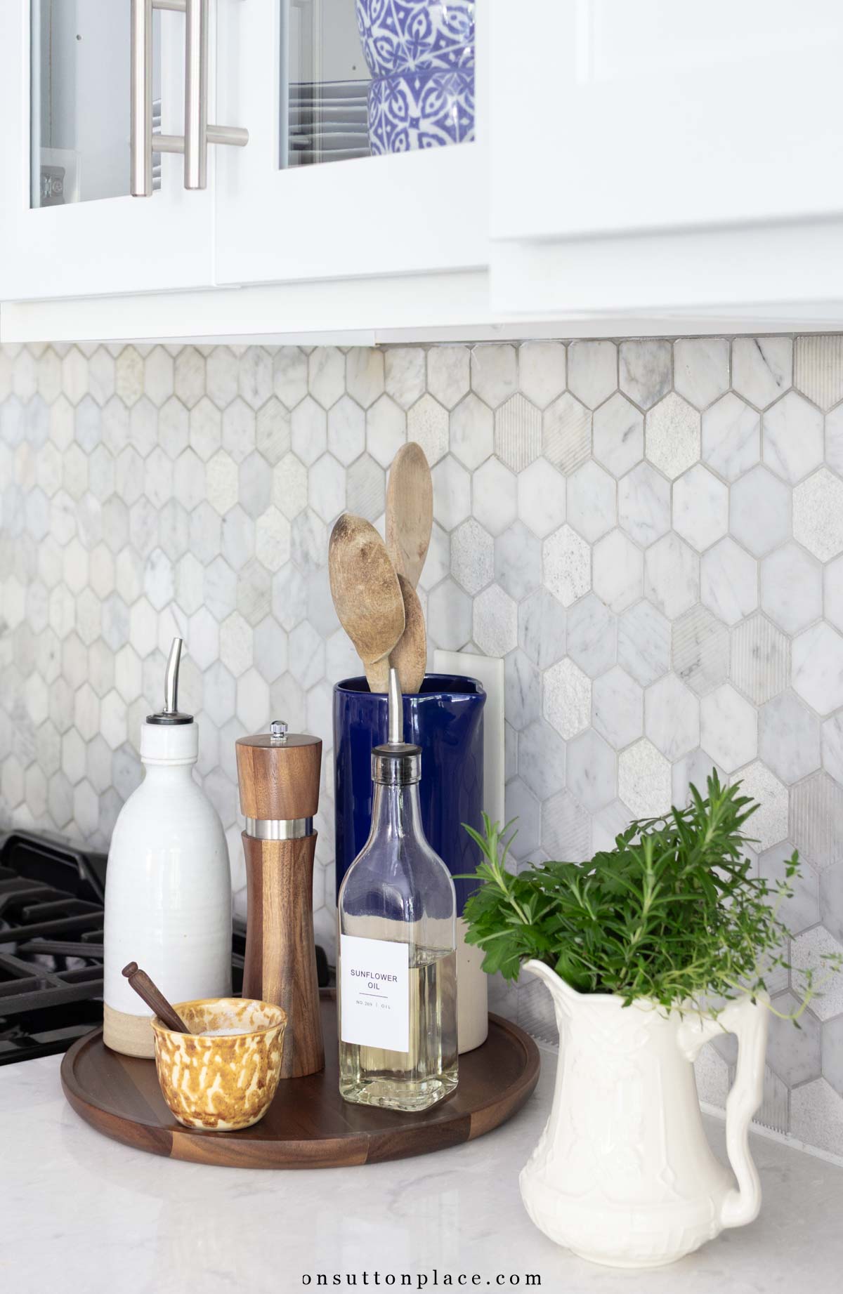 round tray with cooking tools oil cruet salt pepper kitchen essentials