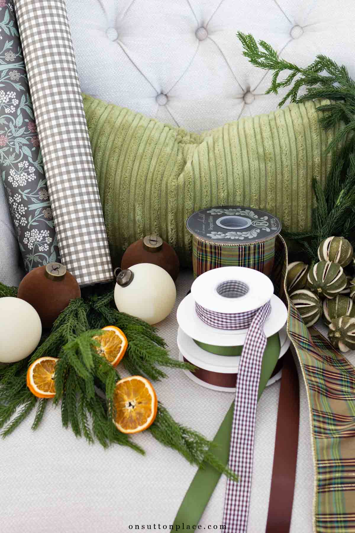 Christmas decor ideas wrapping paper ribbon green lumbar pillow