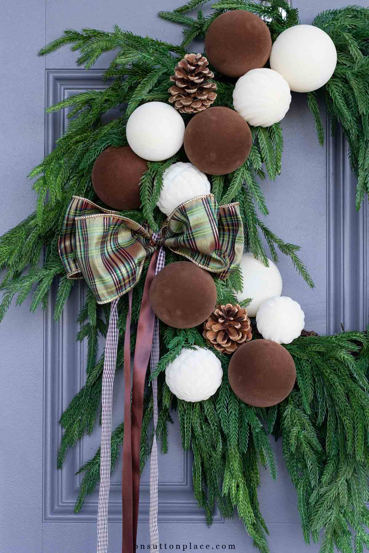 Norfolk pine wreath with brown and ivory ornaments