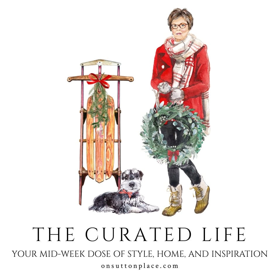 The curated life Christmas logo Ann Millie with sled