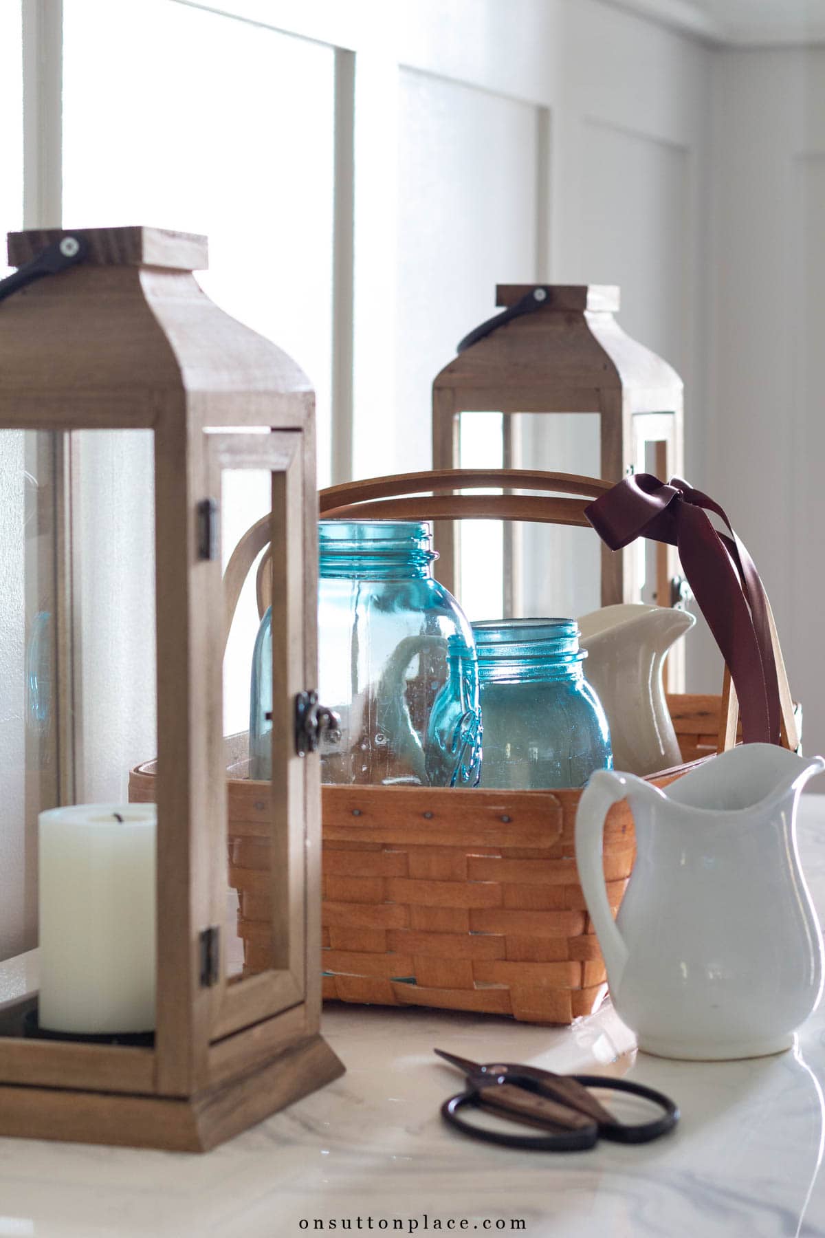 basket for collecting holiday greens with jars and pitchers