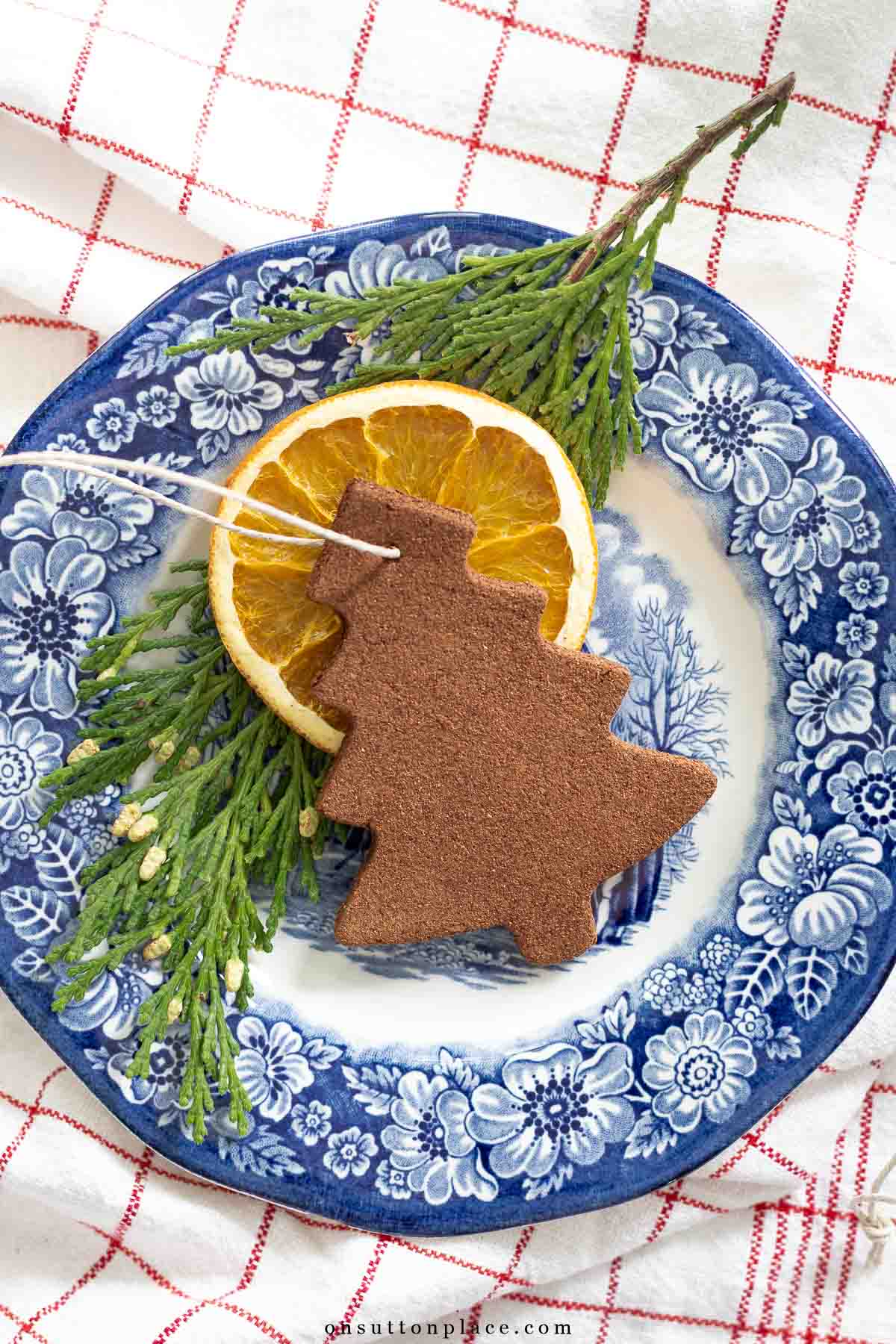 cinnamon ornament Christmas tree on blue plate