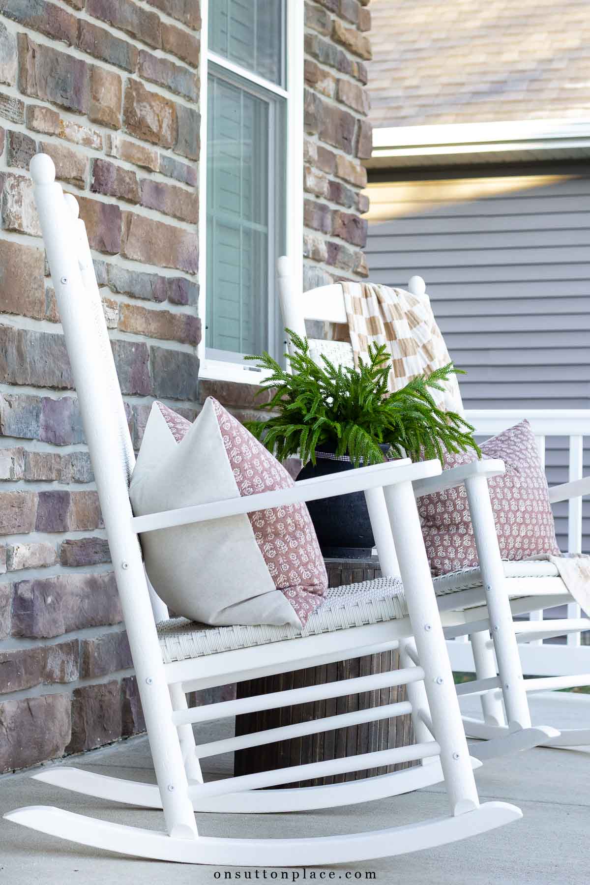 white rockers with pillows on Christmas porch