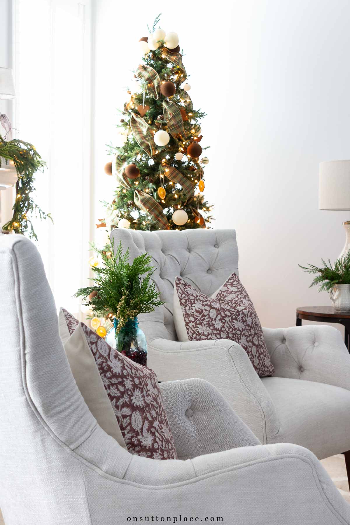 Christmas decor set of tufted chairs with slim tree