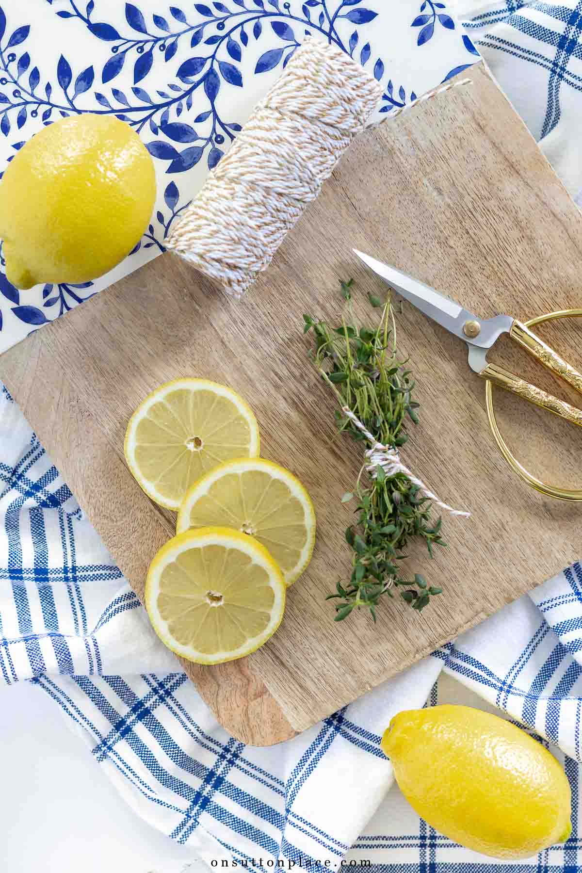 bouquet garni with thyme on wood board with scissors