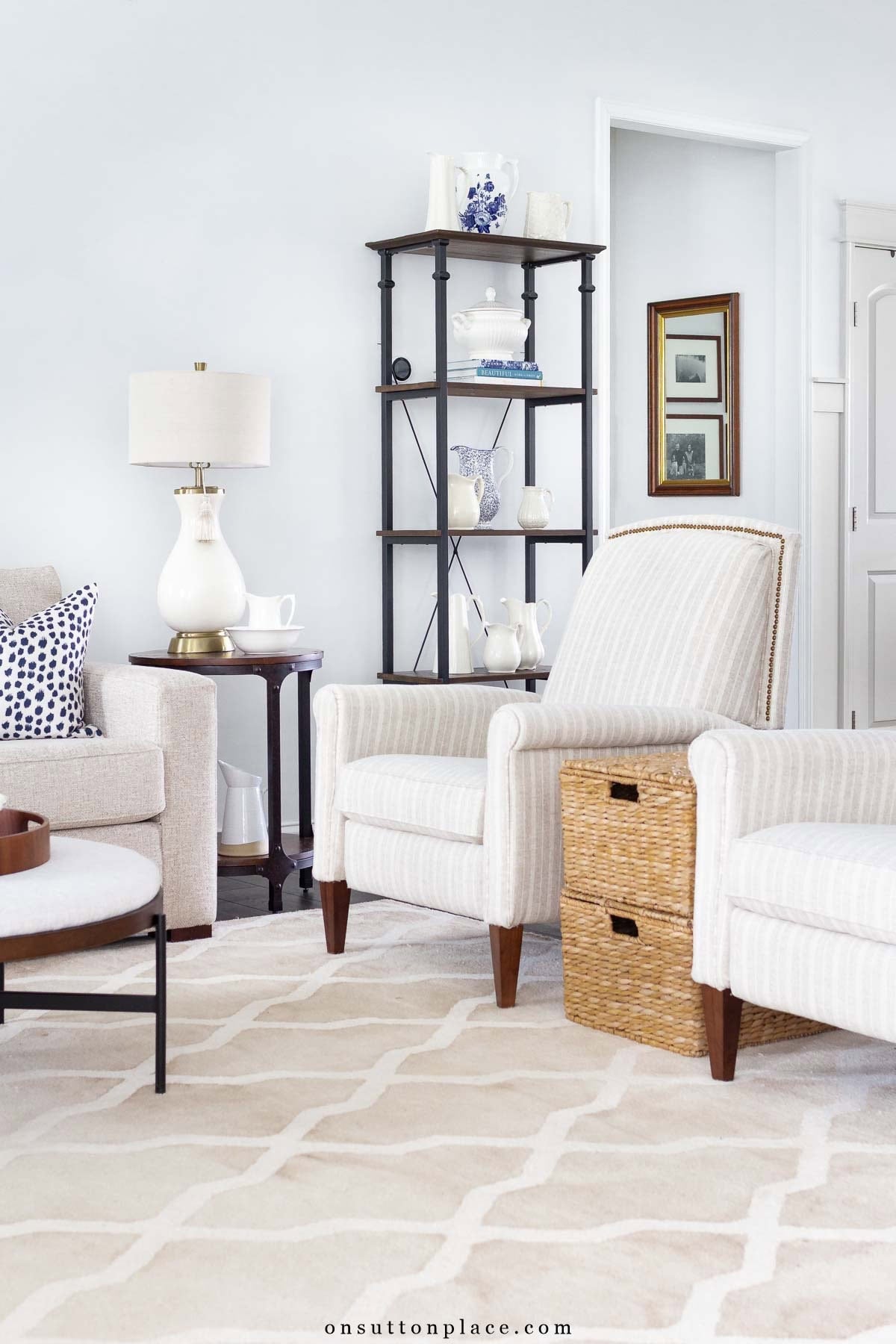 neutral living room sofa chairs etagere (1)