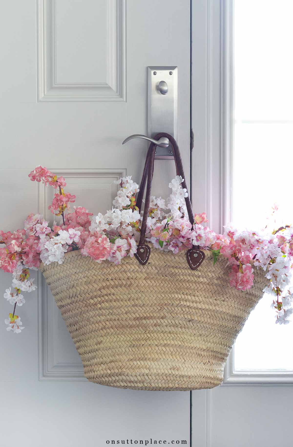 basket decor ideas market basket leather handles pink cherry blossoms
