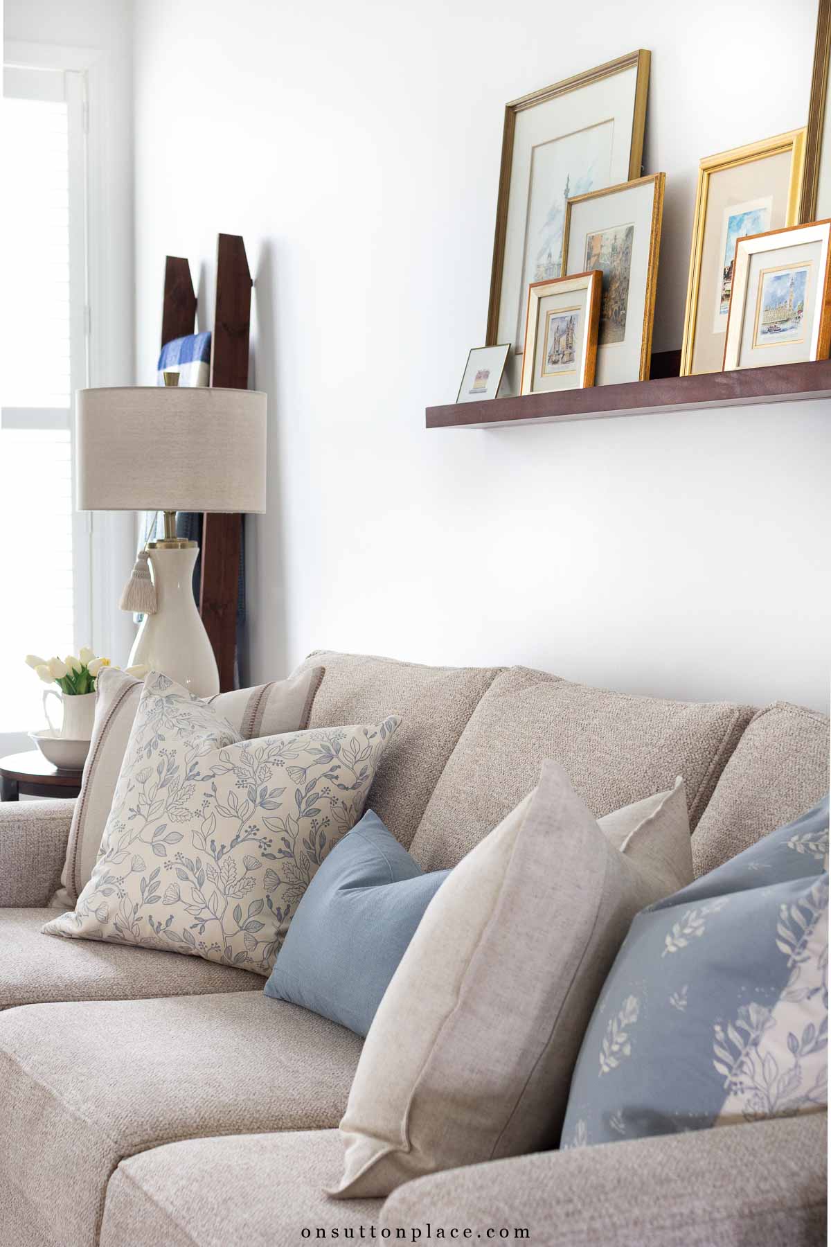 mismatched pillows on sofa different sizes