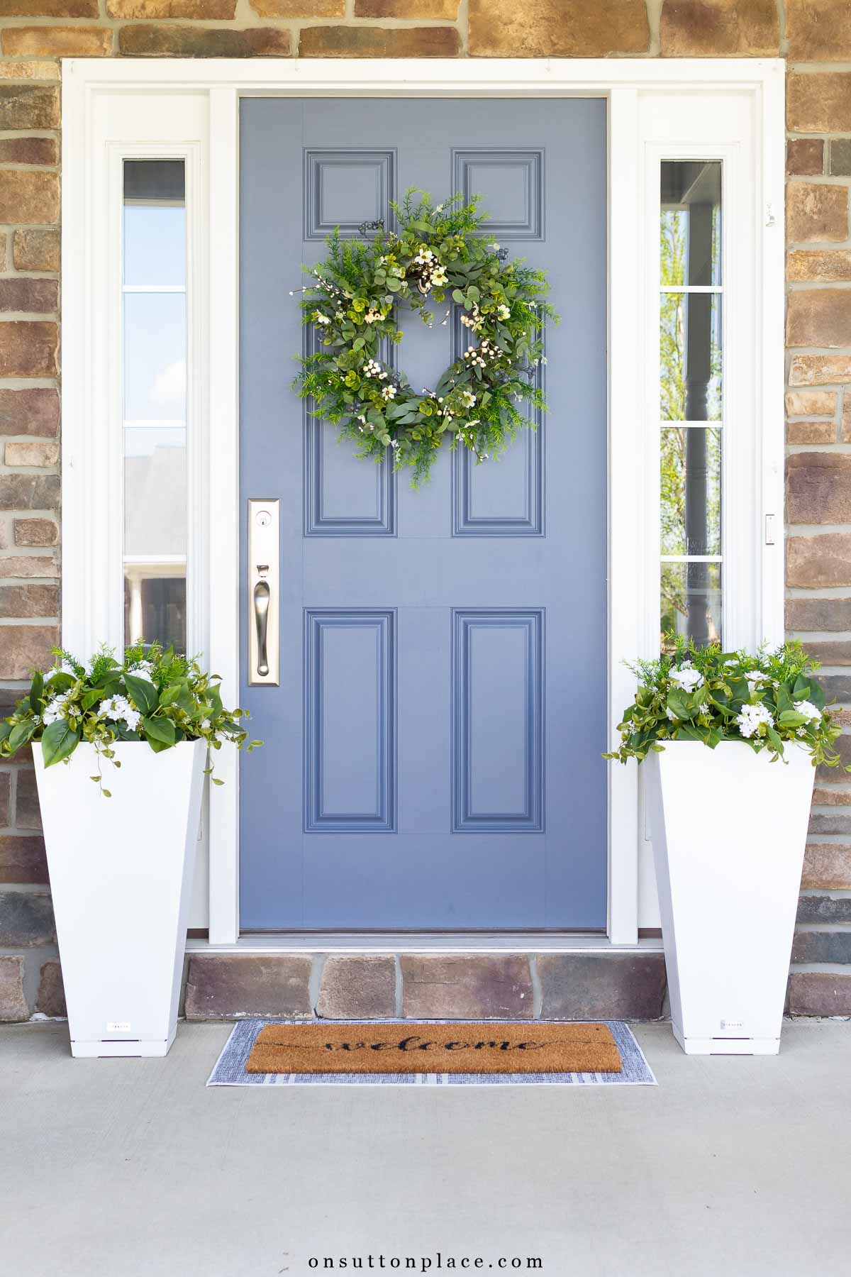blue front door sherwin williams distance with tall flower pots faux plants