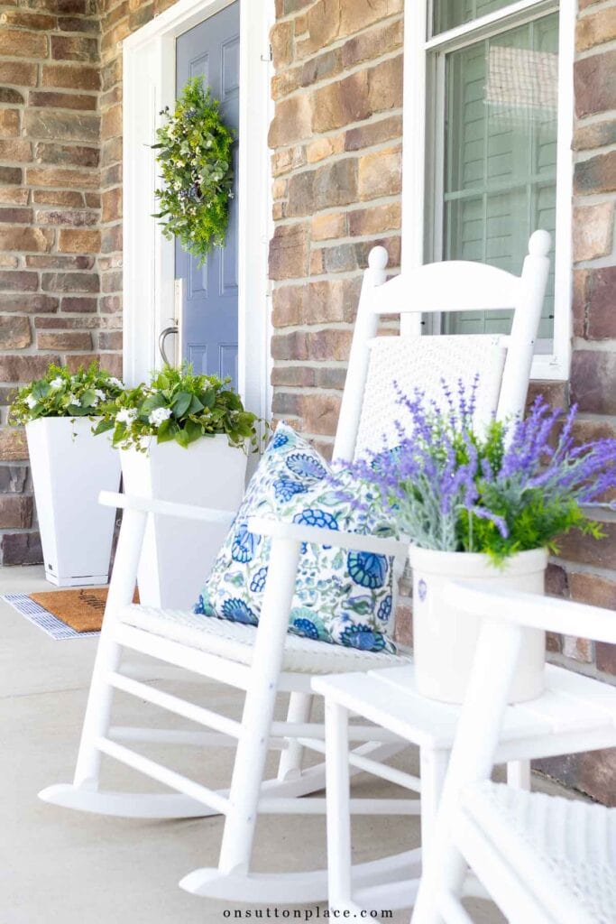 cozy porch in summer sitting area porch flower pots with faux plants