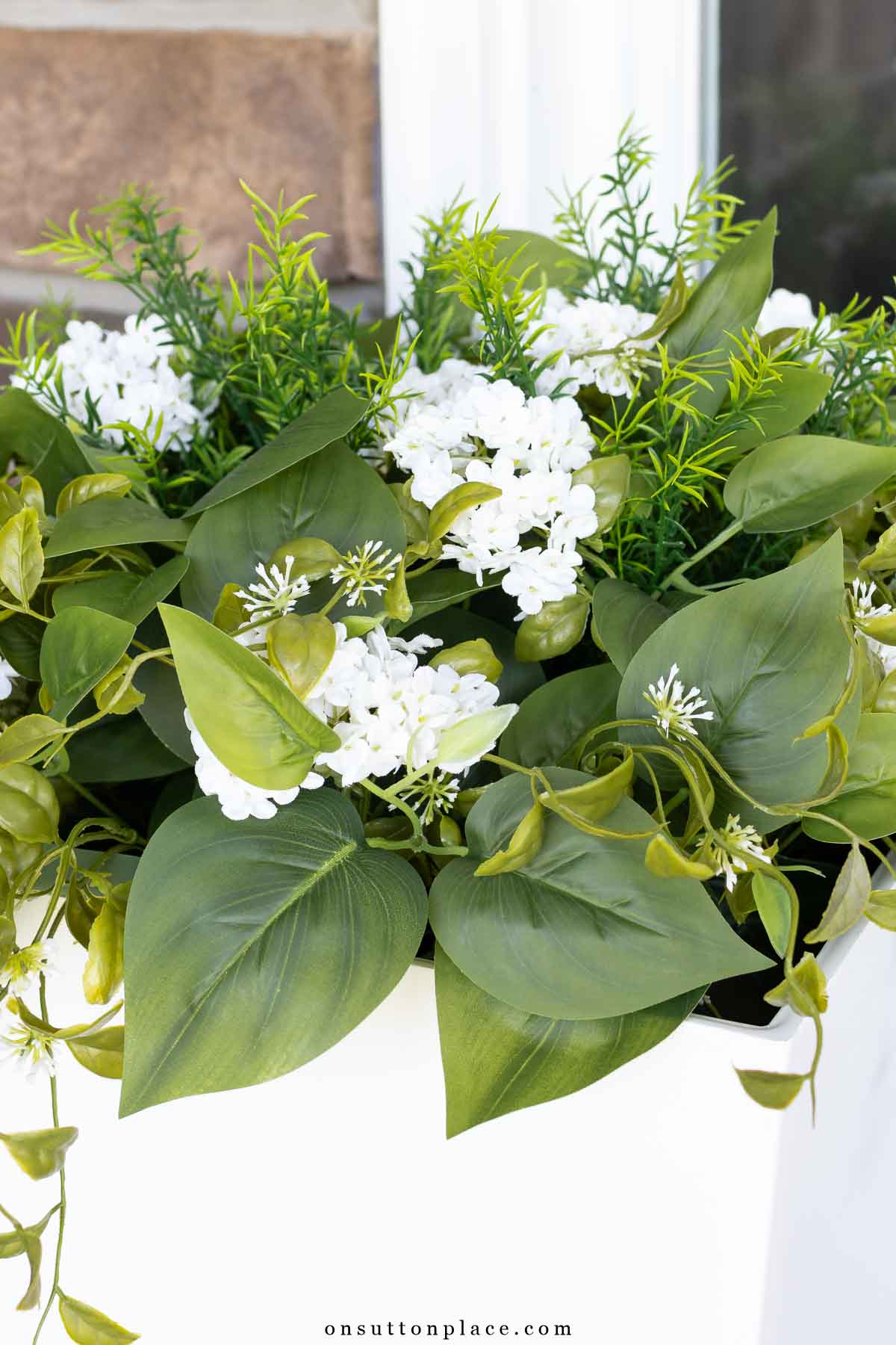front porch flower pot with faux plants