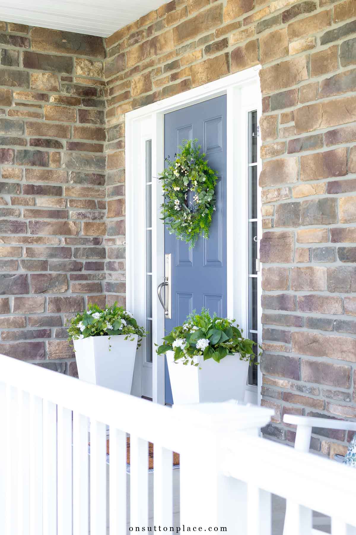 front porch with stone and white railing door color sherwin williams distance