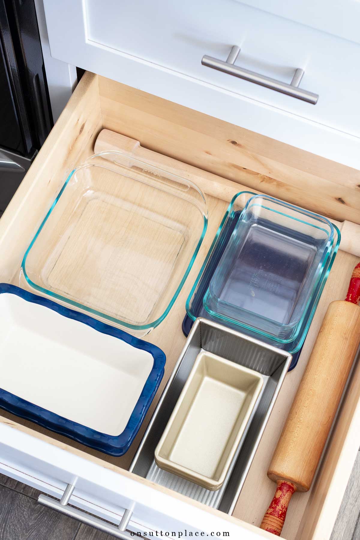 kitchen drawer organization bread pans rolling pin